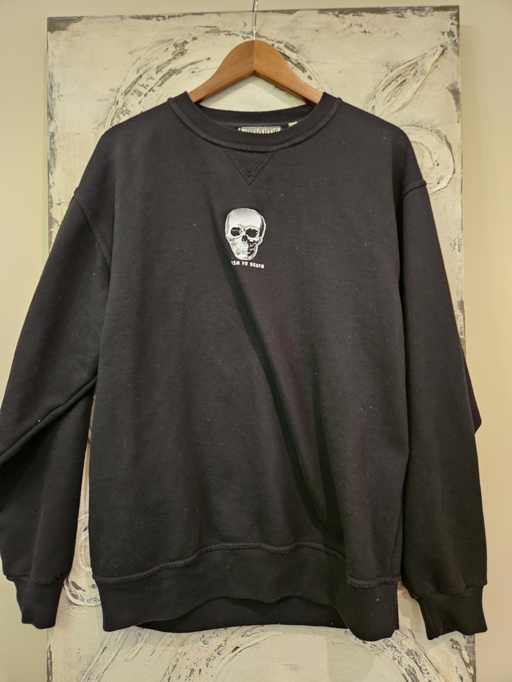 Black Crewneck Sweater with Small Skull Graphic
